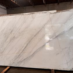 Cornerstone Marble & Granite - they will give you those stone slabs for free and only charge you for the creation of the project