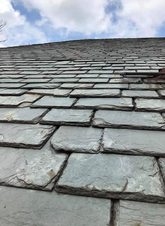 Slide of Melita Roofing