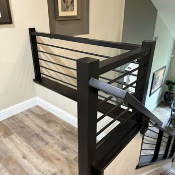 Silver Custom Stairs - Upstairs view of railing. - Carpenters Near Me