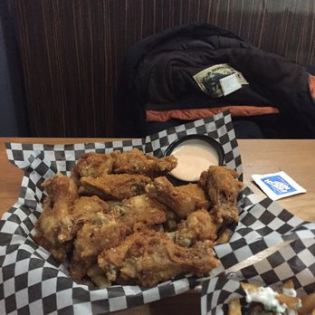 LIMITLESS Bar & Grill - 2 lbs of wings, with fries underneath, $22. - Barbeque Near Me - Thornhill, Ontario