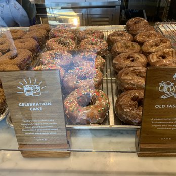 Sidecar Doughnuts & Coffee - Celebration cake = sprinkle donut, made my kid's day alive. LoL, due to sugar rush. - Donuts Near Me - Costa Mesa, California
