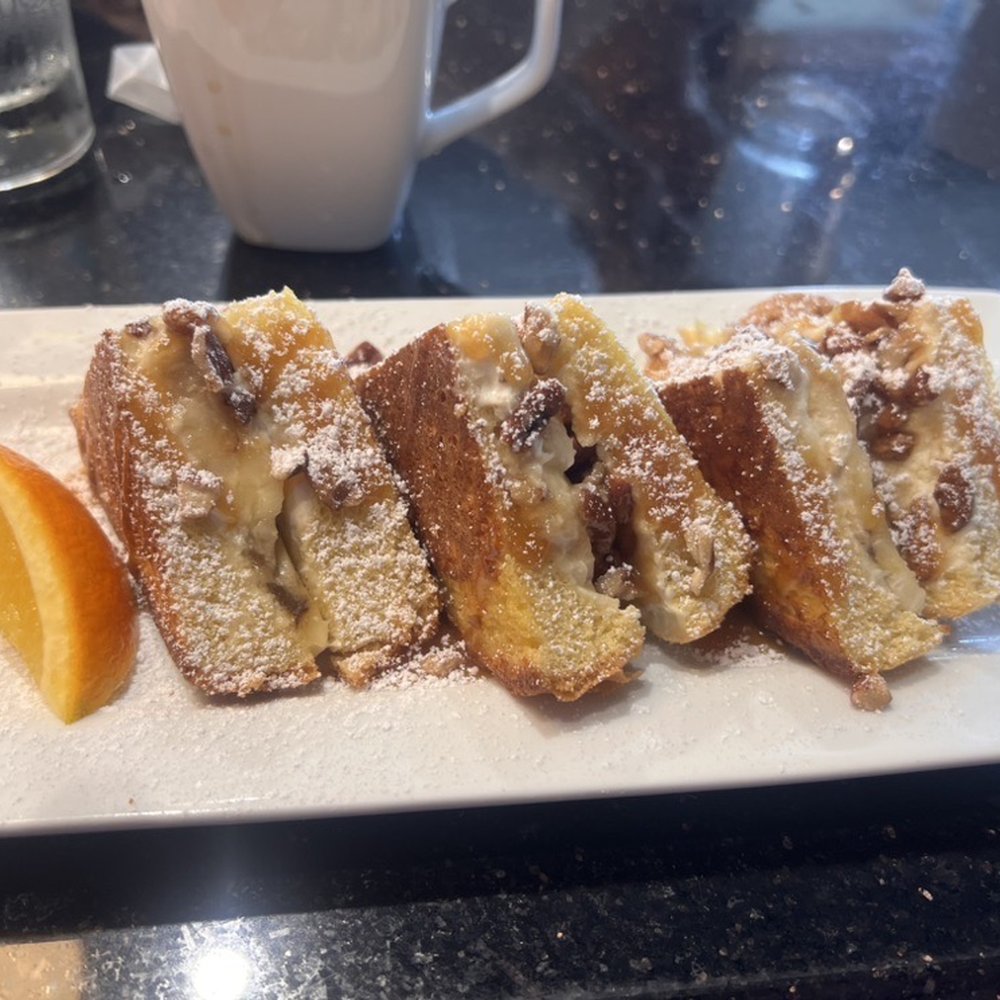 First Watch - Stuffed banana and nut French toast with caramel - Breakfast & Brunch Near Me - Cape Coral, Florida First Watch - Stuffed banana and nut French toast with caramel - Breakfast & Brunch Near Me - Cape Coral, Florida
