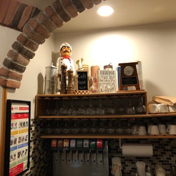 Cafe Napoli - a shelf with wine glasses on it - Italian Near Me - Manchester, New Jersey