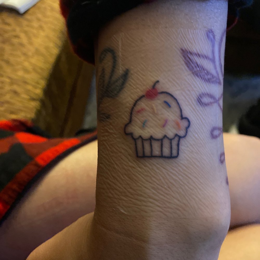 The Dolorosa Tattoo - Cupcake minimalist slightly colored tattoo :) - Tattoo Near Me - Studio City, California The Dolorosa Tattoo - Cupcake minimalist slightly colored tattoo :) - Tattoo Near Me - Studio City, California