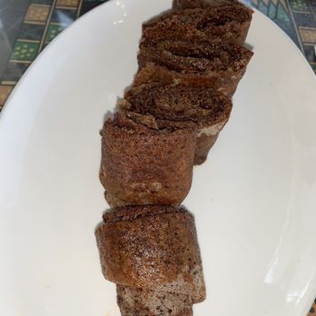 Addis Ethiopian Restaurant - Kategna: Ethiopian spices butter mixed with berbere and rolled in crispy injera - Ethiopian Near Me - Oakland, California Addis Ethiopian Restaurant - Kategna: Ethiopian spices butter mixed with berbere and rolled in crispy injera - Ethiopian Near Me - Oakland, California