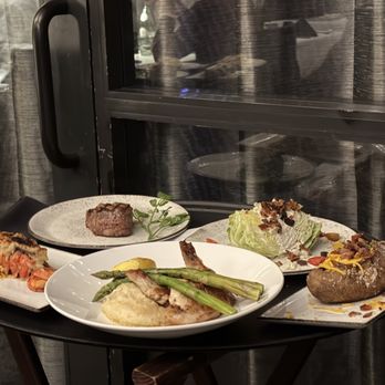 Eddie Merlot's - Lobster tail, wedge salad, baked potato, filet mignon - Seafood Near Me - Boston, Massachusetts Eddie Merlot's - Lobster tail, wedge salad, baked potato, filet mignon - Seafood Near Me - Boston, Massachusetts