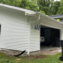 The Roof Sharks - White siding project in progress