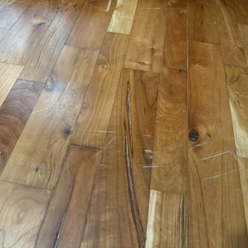 Positive Moves - Excessive scratching and gauging of cherry flooring. - Movers Near Me - Charleston, West Virginia Positive Moves - Excessive scratching and gauging of cherry flooring. - Movers Near Me - Charleston, West Virginia