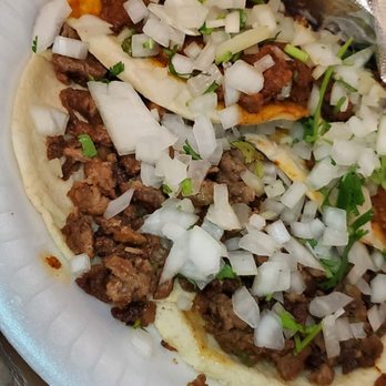 Tacos Los Carnales - They come naked. Onion/cilantro provided in bag. - Mexican Near Me Tacos Los Carnales - They come naked. Onion/cilantro provided in bag. - Mexican Near Me