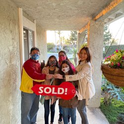 CBM Real Estate & Home Loans - Happy homeowners