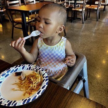 Guatemalteca Bakery & Restaurant - Baby girl enjoying chow mein - Bakeries Near Me - Maywood, California