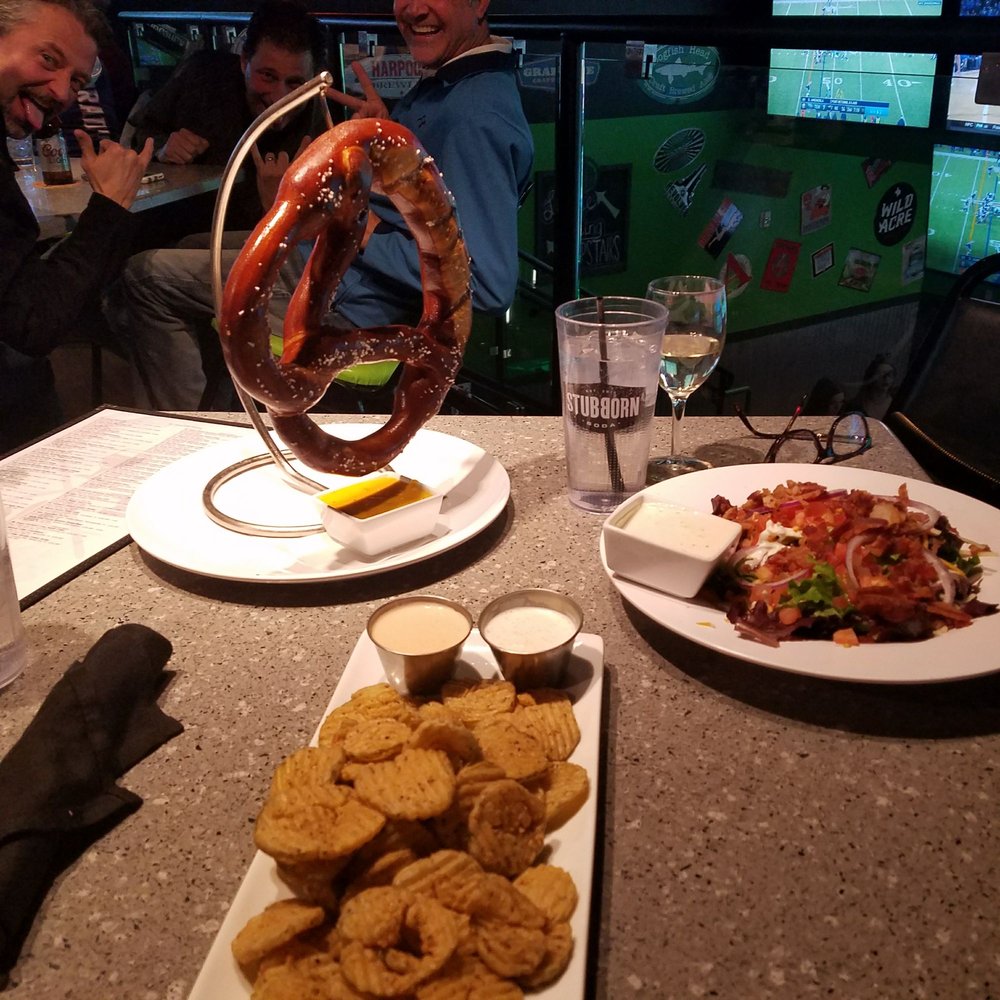 Drunken Donkey - Great food, the pretzel is insane...photo bombed from the next table.  Sigh! - American Near Me - The Colony, Texas