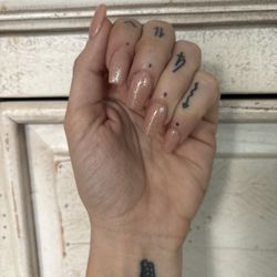 Simply Artistic Nails - Nude base with simple spritzing of champagne glitter