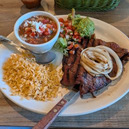 Carné Asada with rice and frijoles en bola, with a side of guacamole and pico de gallo. The steak was perfect! Carné Asada with rice and frijoles en bola, with a side of guacamole and pico de gallo. The steak was perfect!