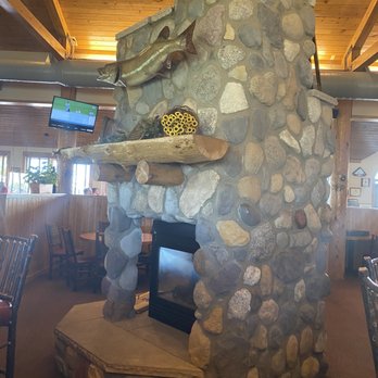 Adventures Restaurant and Pub - Stone fireplace in the bar area - American Near Me - Rice Lake, Wisconsin