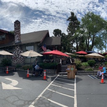 McKay Cottage Restaurant - View of the cottage and COVID-safe waiting area from the parking lot. - American Near Me - Bend, Oregon McKay Cottage Restaurant - View of the cottage and COVID-safe waiting area from the parking lot. - American Near Me - Bend, Oregon