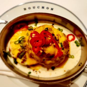 Bouchon - Sausage biscuits and pepper gravy with peppers - French Near Me - Las Vegas, Nevada