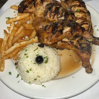 Cantinho Bar & Grill - Frango nu churrasco (chicken) regular plate, with rice and fries - Dive Bars Near Me - Pawtucket, Rhode Island