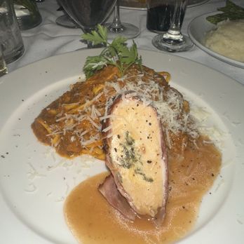 Renato's Palm Beach - We shared the chicken wrapped w prosciutto and tagaliolini alla Bolognese. They split it for us - Italian Near Me - Palm Beach, Florida Renato's Palm Beach - We shared the chicken wrapped w prosciutto and tagaliolini alla Bolognese. They split it for us - Italian Near Me - Palm Beach, Florida