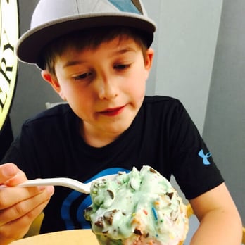 Marble Slab Creamery - a young boy eating an ice cream cone - Ice Cream & Frozen Yogurt Near Me - Langley, British Columbia