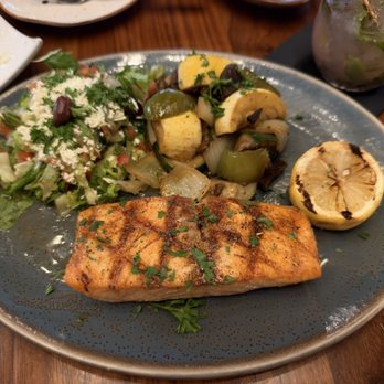 Sufrat Mediterranean Grill - Salmon Fillet Platter, sauteed vegetables, Greek Salad - Mediterranean Near Me - Doral, Florida