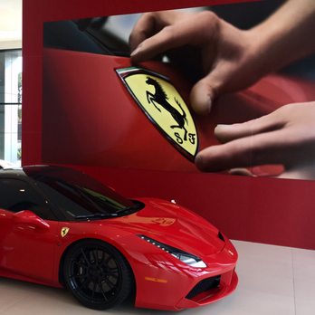 Ferrari - Newport Beach - Awesome artwork on the wall behind the $360K Ferrari. - Car Dealers Near Me - Newport Beach, California