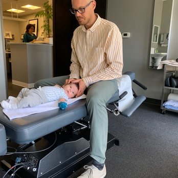 Michael Tebbe, DC - Baby bodywork helping baby relax and feed better - Chiropractors Near Me - Los Angeles, California Michael Tebbe, DC - Baby bodywork helping baby relax and feed better - Chiropractors Near Me - Los Angeles, California