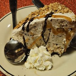 Lucille's Smokehouse Bar-B-Que - Snickers® Ice Cream Pie. Delicious but heavy!