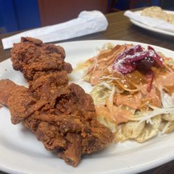 Pollo con tajadas/fried chicken,fried plantains , coleslaw, and unique sauce!!