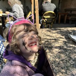 Happy toddler in the back garden