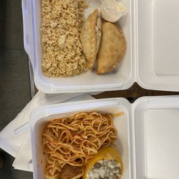 Empanada combo (two empanadas with garlic rice), spaghetti and meatballs, and a stuffed pepper.