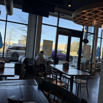 Just Love Coffee Cafe - Eating area looking out - Coffee & Tea Near Me - Carmel, Indiana Just Love Coffee Cafe - Eating area looking out - Coffee & Tea Near Me - Carmel, Indiana