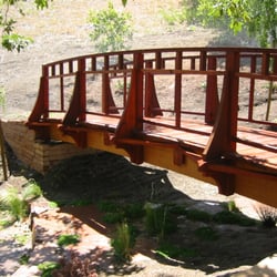Native Concepts Landscape & Design - Custom designed cedar wood bridge. (Thousand Oaks)