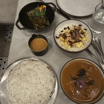 Copra - Chicken with rice (front) cod with rice and sauce (back) - Indian Near Me - San Francisco, California Copra - Chicken with rice (front) cod with rice and sauce (back) - Indian Near Me - San Francisco, California