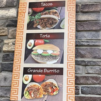 La Plaza Taqueria - a menu on a stone wall - Mexican Near Me - Amherst, Ohio La Plaza Taqueria - a menu on a stone wall - Mexican Near Me - Amherst, Ohio