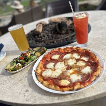 The Bench - Pepperoni pizza , beer, Fire Roasted Brussels Sprouts and Guava Garden drink - New American Near Me - Pebble Beach, California The Bench - Pepperoni pizza , beer, Fire Roasted Brussels Sprouts and Guava Garden drink - New American Near Me - Pebble Beach, California