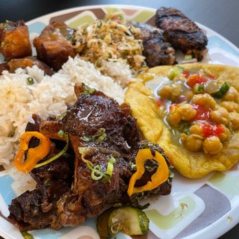 Cane - Doubles, Oxtail, coconut rice, Geera Pork, cabbage, Jerk Wings. - Trinidadian Near Me - Washington, DC, District of Columbia Cane - Doubles, Oxtail, coconut rice, Geera Pork, cabbage, Jerk Wings. - Trinidadian Near Me - Washington, DC, District of Columbia