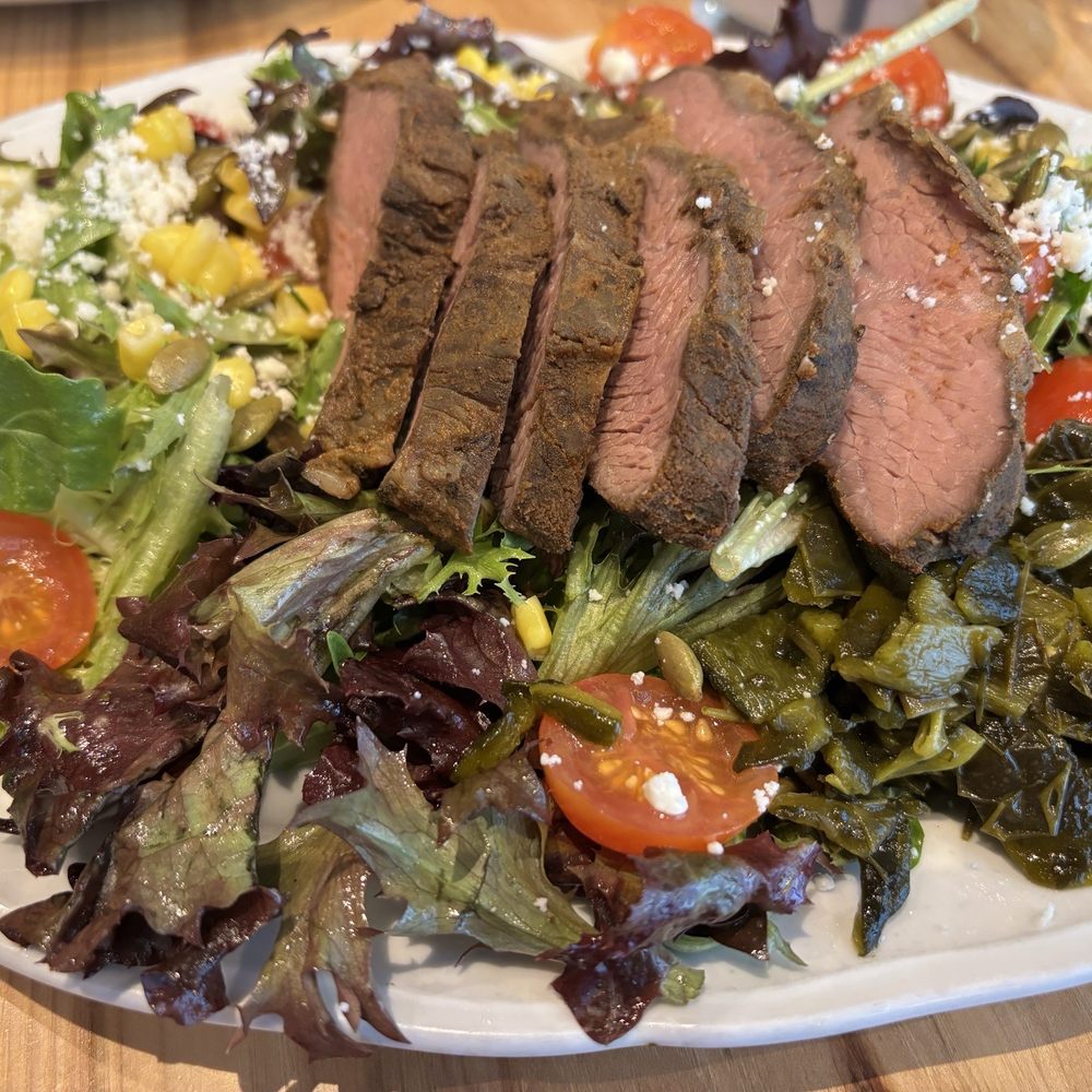 Hill & Vine - Avocado & Lime Salad with tri tip steak, no tomatillo pico, add roasted poblanos - Cocktail Bars Near Me - Fredericksburg, Texas