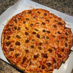 Signature Bar & Grill - Large Italian sausage pizza  via pickup from the Signature! They had it ready and were very good at social distancing!