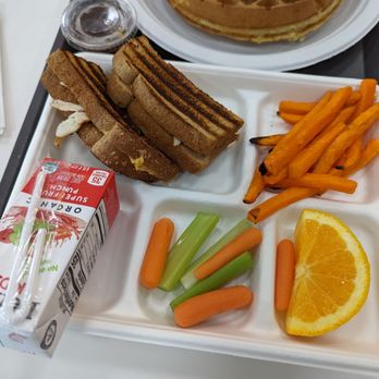 Playroom Cafe Two - Kiddy meal - turkey and cheese panini with side of veggies, sweet potato fries, and orange; apple juice - Venues & Event Spaces Near Me - Naperville, Illinois