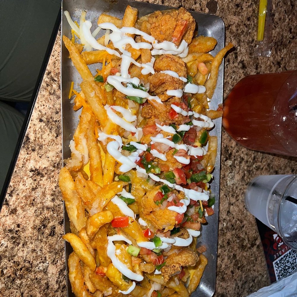 Prospect Park - loaded fried with fried shrimp - Sports Bars Near Me - Houston, Texas Prospect Park - loaded fried with fried shrimp - Sports Bars Near Me - Houston, Texas