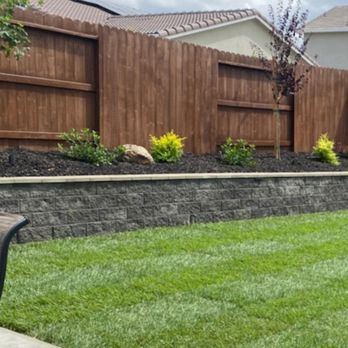 Agent Landscapes - a backyard with a fence and a lawn - Masonry/Concrete Near Me - Lincoln, California