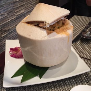 Khao Thai - Ho-Mok-Tha-Lay: seafood curry served in a coconut!! The picture doesn't do it justice. It was amazing! - Thai Near Me - Paris, 75 Khao Thai - Ho-Mok-Tha-Lay: seafood curry served in a coconut!! The picture doesn't do it justice. It was amazing! - Thai Near Me - Paris, 75