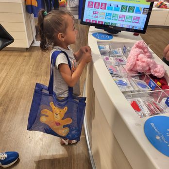Build-A-Bear Workshop - My oldest working on picking a scent for her build a bear - Toy Stores Near Me - Montebello, California