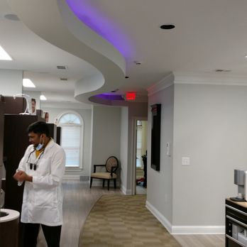 Roswell Modern Dentistry - Dr. Kakadia so engaged with his patients, and his modern office. - Cosmetic Dentists Near Me - Roswell, Georgia Roswell Modern Dentistry - Dr. Kakadia so engaged with his patients, and his modern office. - Cosmetic Dentists Near Me - Roswell, Georgia
