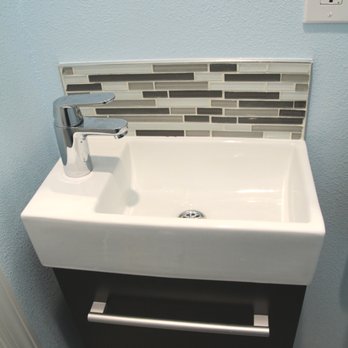Best Tile - Our floating sink and black vanity cabinet. Glass mosaic backsplash - Building Supplies Near Me - Santa Clara, California