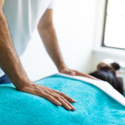 Sun Rise World Therapies - Our client enjoying a soothing & therapeutic massage therapy in Laguna Niguel at Sun Rise World Therapies, the best massage place in Laguna!