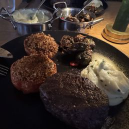Fillet Mignon with mashed potatoes, crispy Brussel sprouts and broiled tomato Fillet Mignon with mashed potatoes, crispy Brussel sprouts and broiled tomato