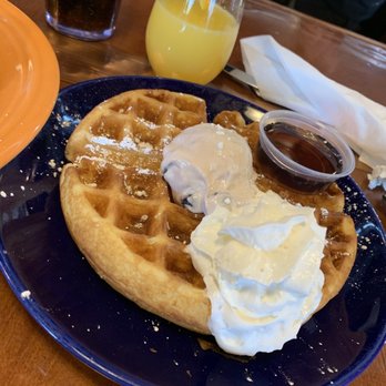 Thunderbird Cafe - Waffle with blueberry cream cheese butter. Mimosa - Breakfast & Brunch Near Me - McGaheysville, Virginia