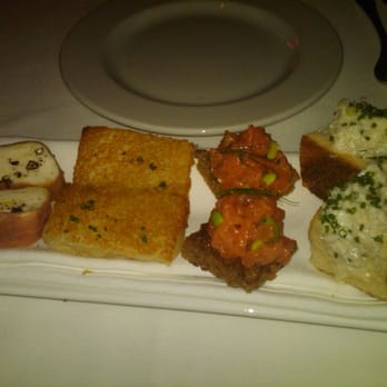 BIX - Special Hors D'oeuvres sampler: mozzarella wrapped in procuitto, onion pancake, salmon tartare, and crab roll - American Near Me - San Francisco, California BIX - Special Hors D'oeuvres sampler: mozzarella wrapped in procuitto, onion pancake, salmon tartare, and crab roll - American Near Me - San Francisco, California